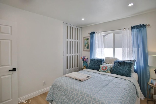 bedroom featuring light hardwood / wood-style flooring