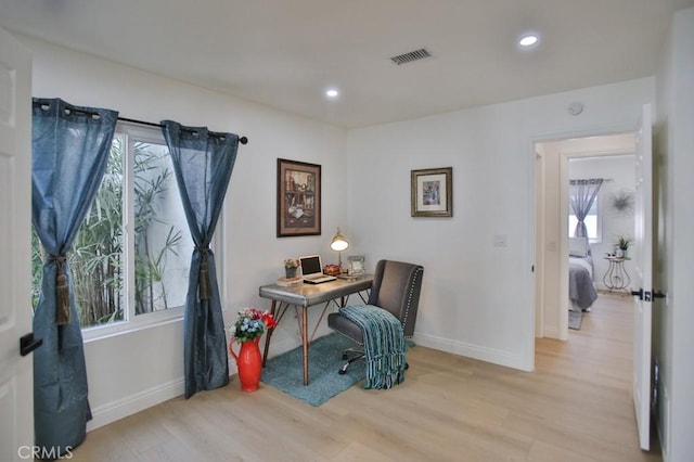 office space featuring light wood-type flooring