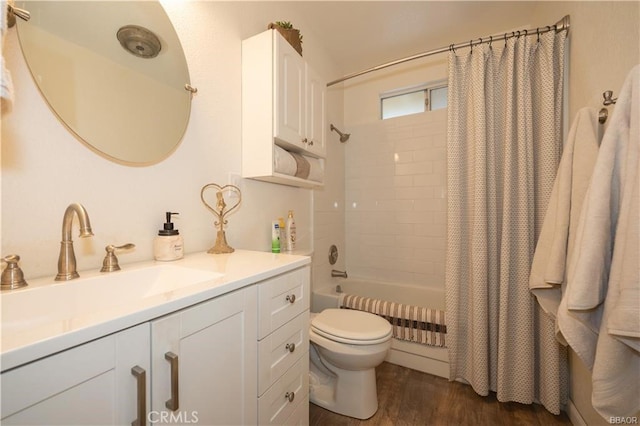 full bathroom with toilet, vanity, shower / bath combo with shower curtain, and hardwood / wood-style flooring