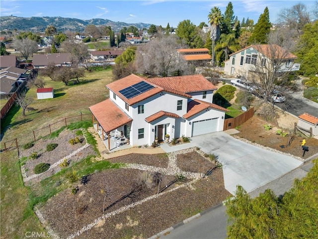 drone / aerial view featuring a mountain view