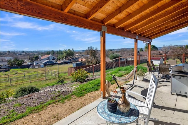 view of patio / terrace with outdoor dining space and fence