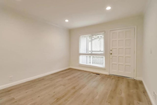 foyer entrance featuring light hardwood / wood-style floors