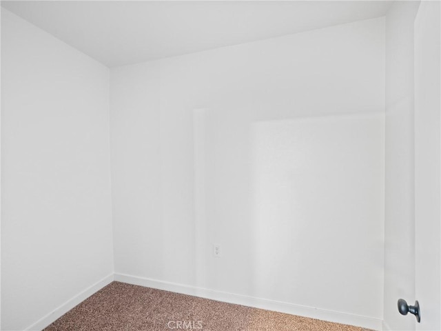 unfurnished room featuring carpet flooring