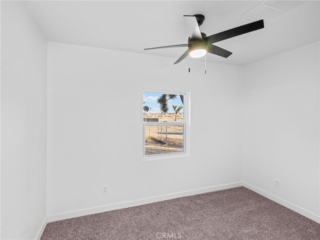 spare room with ceiling fan and carpet flooring