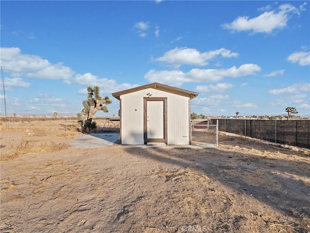 view of outbuilding featuring a rural view