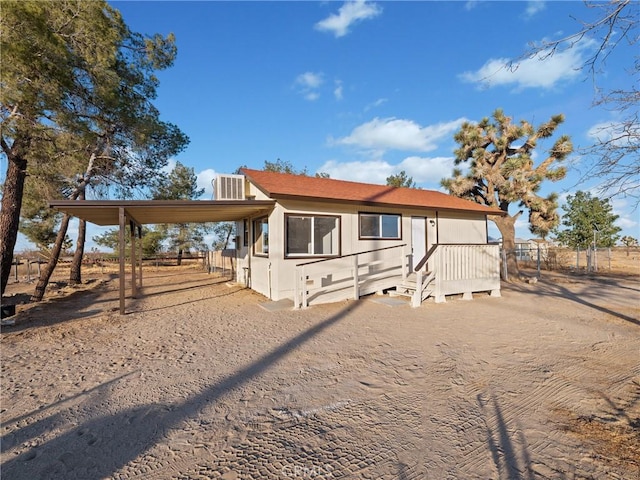 view of front of property featuring cooling unit