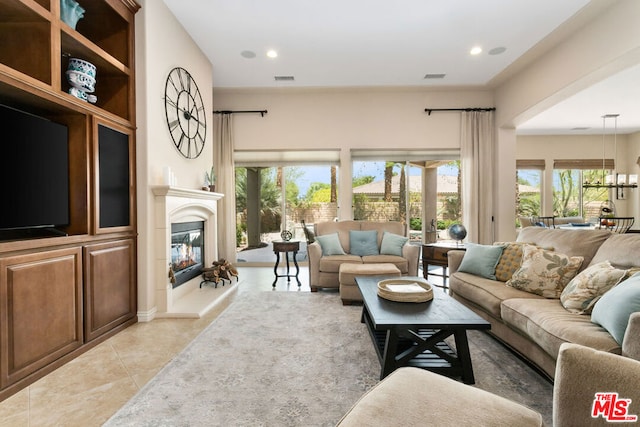 living room with light tile patterned floors