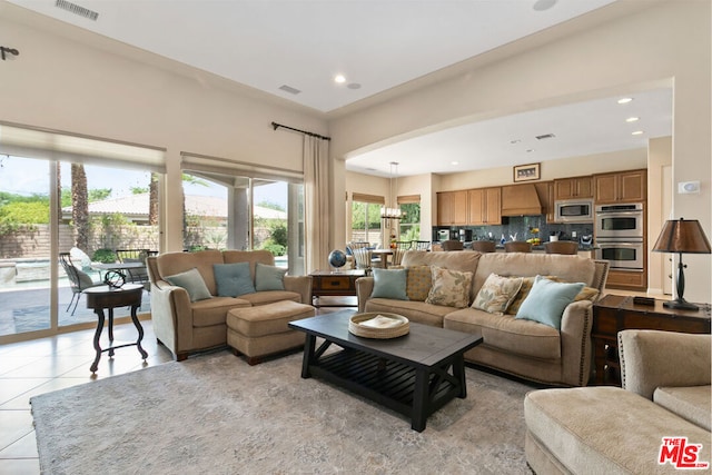 living room with light tile patterned flooring