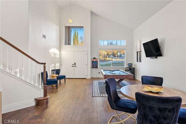 interior space with high vaulted ceiling, pool table, and wood-type flooring