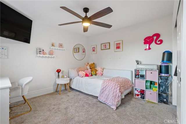 carpeted bedroom with ceiling fan