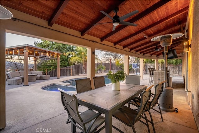 view of patio / terrace featuring a gazebo, a fenced in pool, ceiling fan, and an outdoor hangout area