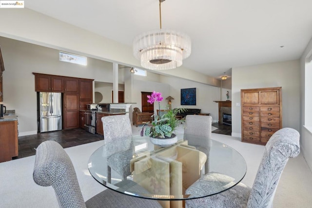 dining area with an inviting chandelier