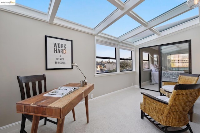 office area featuring vaulted ceiling and carpet floors