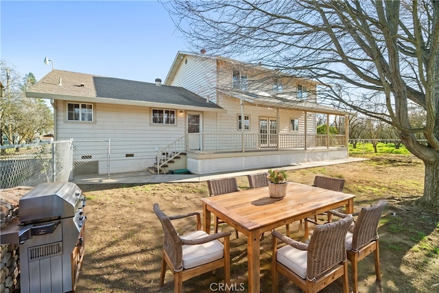 rear view of house featuring a patio