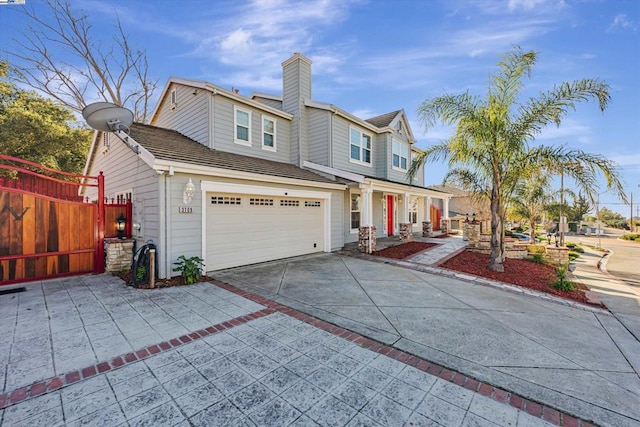 view of front of property featuring a garage