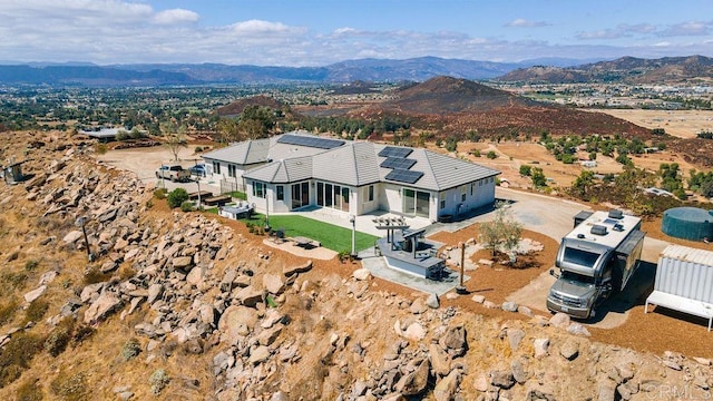 drone / aerial view with a mountain view