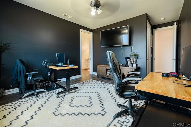 office area with ceiling fan and hardwood / wood-style flooring