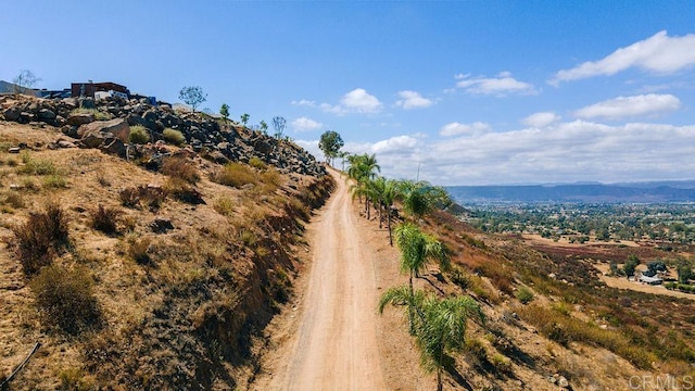 property view of mountains featuring a rural view