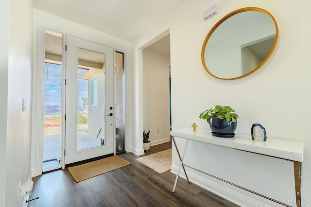 doorway with dark hardwood / wood-style floors