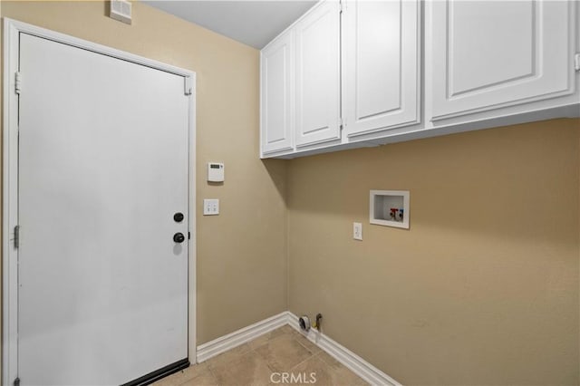 washroom featuring cabinets, washer hookup, gas dryer hookup, and light tile patterned flooring