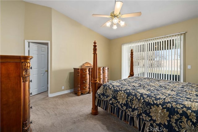 carpeted bedroom with vaulted ceiling and ceiling fan