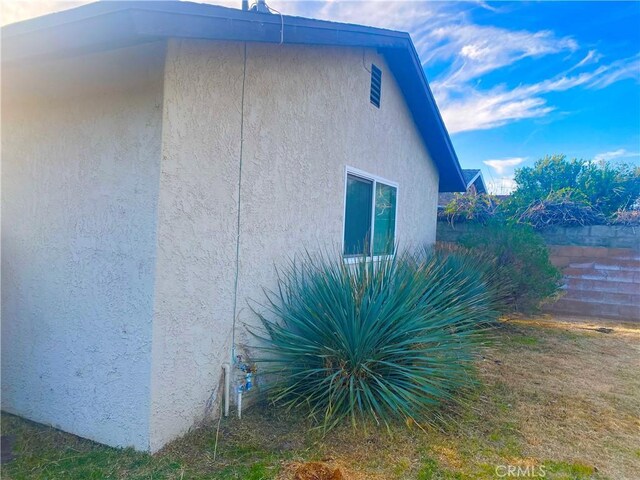 44504 Watford Ave, Lancaster, CA 93535 - view of property exterior featuring stucco siding