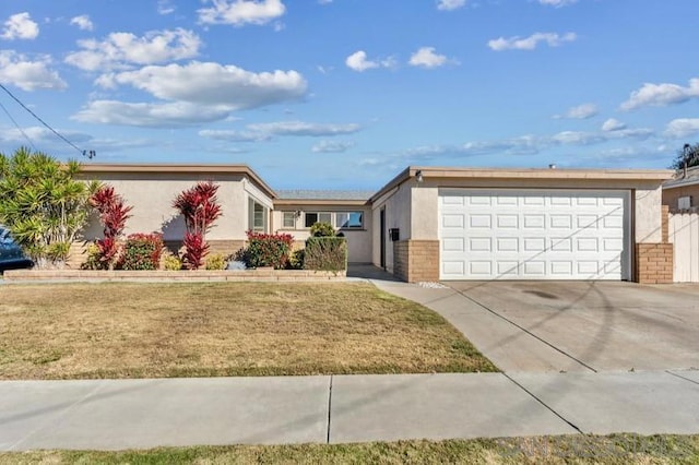 ranch-style home with a front yard and a garage