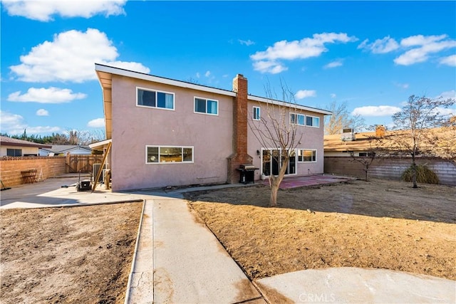 44028 Halcom Ave, Lancaster, CA 93536 - rear view of house featuring a patio