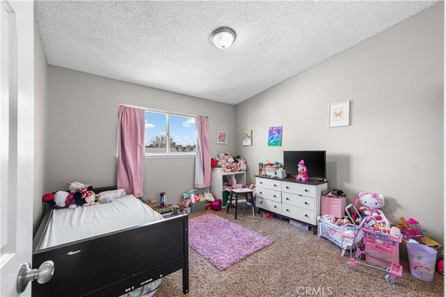 44028 Halcom Ave, Lancaster, CA 93536 - carpeted bedroom with a textured ceiling