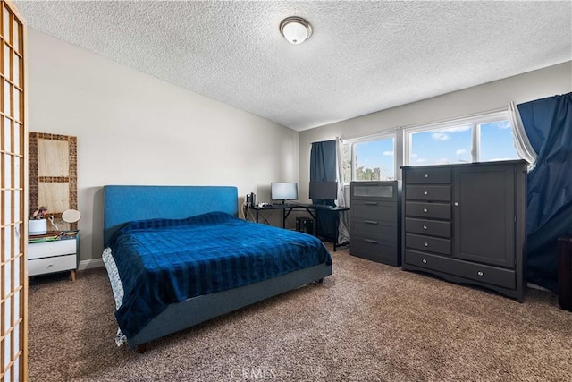 44028 Halcom Ave, Lancaster, CA 93536 - bedroom featuring a textured ceiling and dark colored carpet