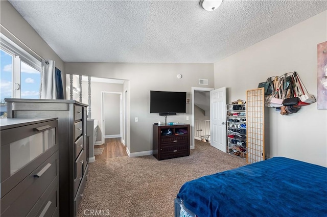 44028 Halcom Ave, Lancaster, CA 93536 - bedroom with a textured ceiling, carpet flooring, and vaulted ceiling