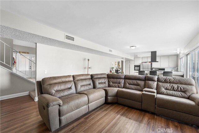 44028 Halcom Ave, Lancaster, CA 93536 - living room with dark hardwood / wood-style floors and sink
