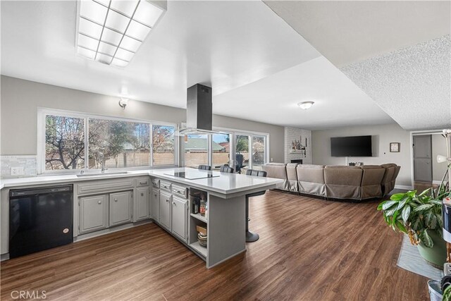 44028 Halcom Ave, Lancaster, CA 93536 - kitchen with black appliances, sink, dark hardwood / wood-style floors, kitchen peninsula, and gray cabinetry