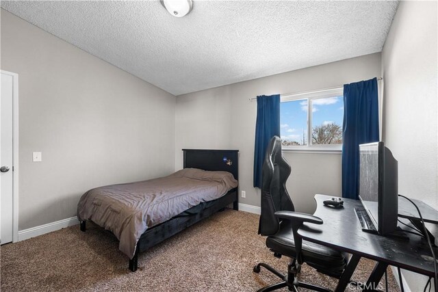 44028 Halcom Ave, Lancaster, CA 93536 - carpeted bedroom with a textured ceiling