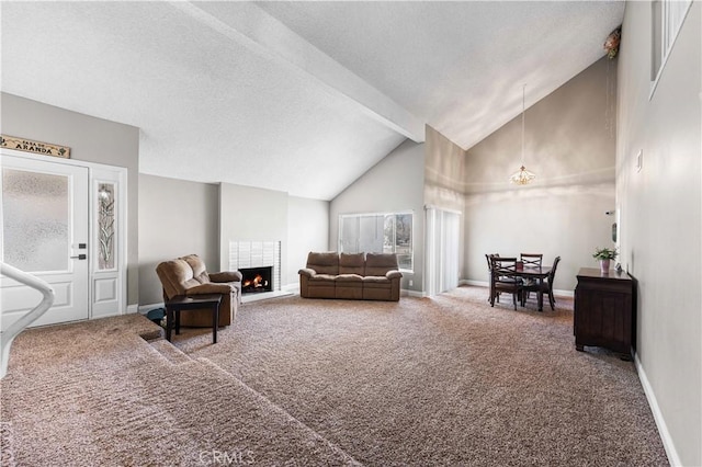 44028 Halcom Ave, Lancaster, CA 93536 - living room featuring carpet, an inviting chandelier, beamed ceiling, and a fireplace