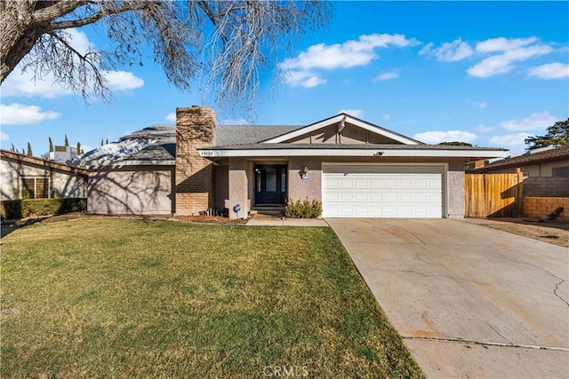 ranch-style home featuring a front yard and a garage