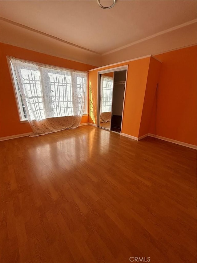 empty room featuring hardwood / wood-style flooring