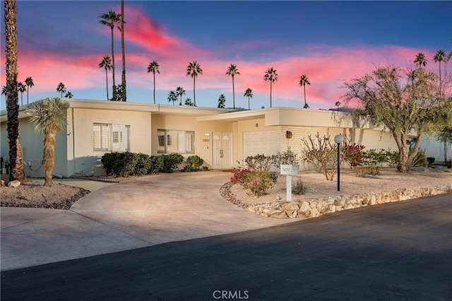 view of front of property featuring a garage