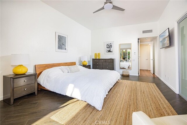 bedroom featuring dark wood-type flooring and ceiling fan