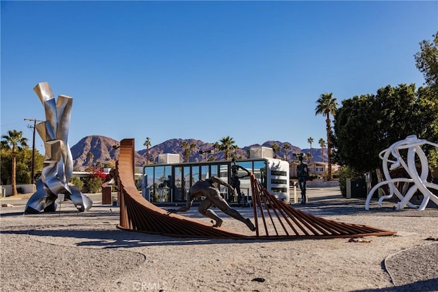 view of playground with a mountain view