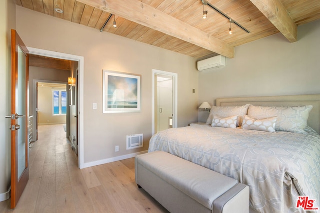 bedroom featuring wood ceiling, light hardwood / wood-style floors, rail lighting, a wall mounted AC, and beam ceiling