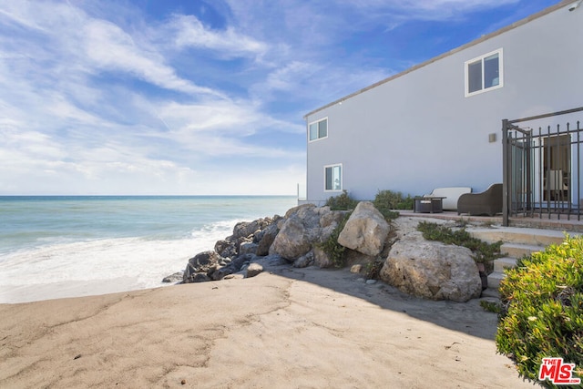 property view of water with a beach view