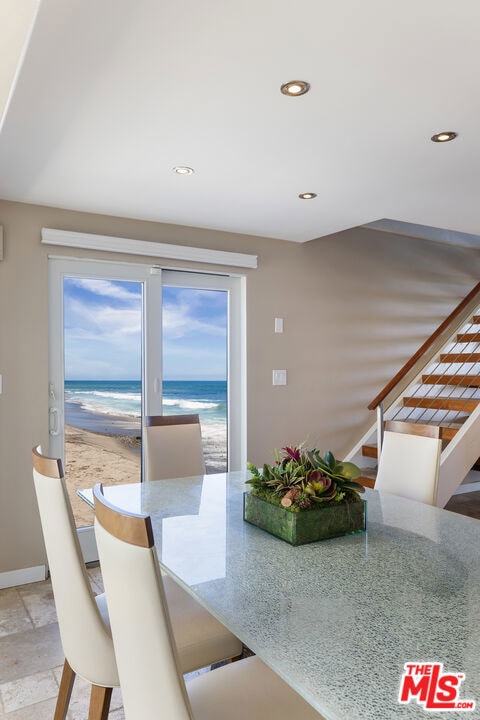 dining area with a water view