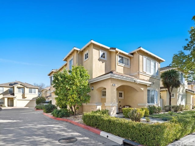 view of front of home with a garage