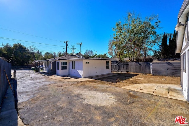 rear view of property with a patio area