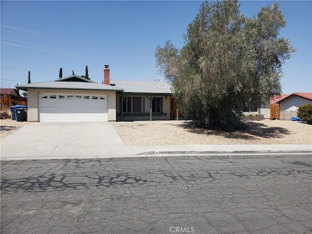 single story home featuring a garage