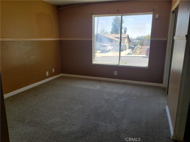 empty room with carpet floors