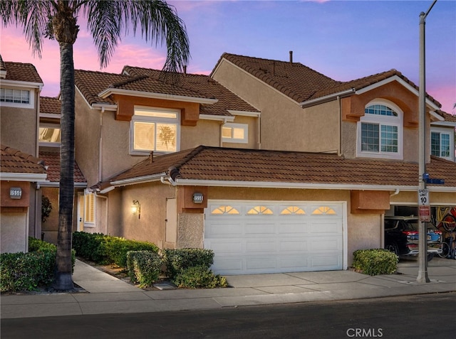 view of property with a garage