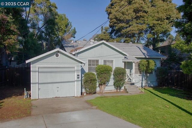 single story home featuring a garage and a front lawn