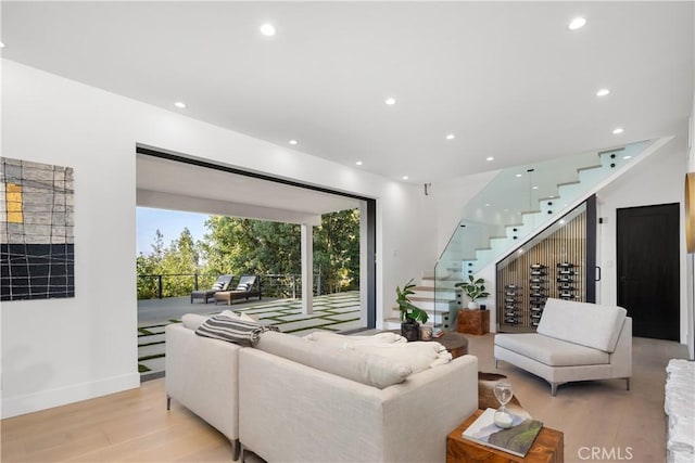 living room with light hardwood / wood-style flooring